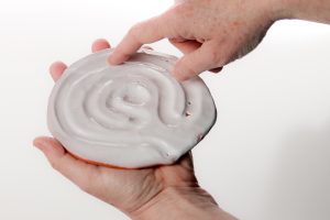 The advantage of the grooved finger path in the clay is that one does not have to look at the labyrinth while tracing the path, so the “walker” can close their eyes to meditate while using the finger labyrinth. This also allows those who cannot see or cannot see well to do a labyrinth walk. I like the way the cool clay feels as my finger traces the path.