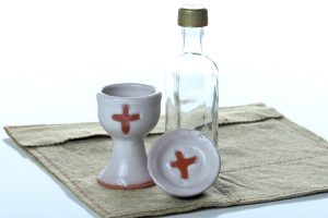 Handthrown and decorated ceramic communion chalice (approx. 3 1/2 inches tall) and paten (approx.2 1/4 inches diam.) These can be sanitized in the dishwasher when needed.