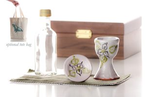 Handthrown and decorated ceramic communion chalice (approx. 3 1/2 inches tall) and paten (approx.2 1/4 inches diam.) These can be sanitized in the dishwasher when needed.