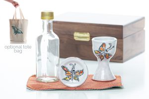 Handthrown and decorated ceramic communion chalice )approx. 3 1/2 inches tall). And paten (approx 2 1/4 inches dial.) These can be sanitized in the dishwasher when needed.