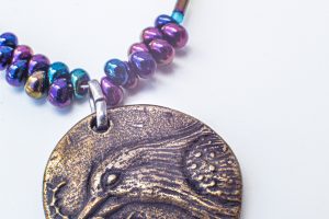 spirit of creation liturgical necklace dickinson bird